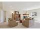 Inviting living room with plush seating, fireplace, and built-in entertainment center for cozy gatherings at 4619 Mohawk Dr, Larkspur, CO 80118