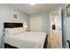 Bedroom featuring carpet flooring, a double closet and light blue walls at 12671 Meadow Bridge Way, Parker, CO 80134