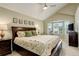 Spacious main bedroom featuring a vaulted ceiling, large windows and comfortable furniture at 12671 Meadow Bridge Way, Parker, CO 80134