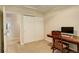 Office featuring carpet flooring, a desk and a double closet at 12671 Meadow Bridge Way, Parker, CO 80134