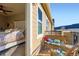 Cozy balcony adjacent to bedroom with comfortable seating and bright, sunny views at 11250 Florence St # 22B, Commerce City, CO 80640