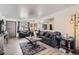 Comfortable living room with ample natural light and view of the outdoors at 1002 S Miller St, Lakewood, CO 80226