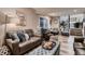 Comfortable living room with stylish furnishings and plenty of natural light at 5611 W Bates Ave, Denver, CO 80227