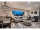 Stylish living room with neutral colors and modern decor at 5611 W Bates Ave, Denver, CO 80227
