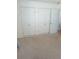 Bedroom featuring carpet and closet with sliding doors at 3018 S Cherry Way, Denver, CO 80222