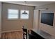 Bright kitchen area features a chalkboard wall and windows for plenty of natural light at 3018 S Cherry Way, Denver, CO 80222