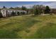 Aerial view of townhouses next to a park at 6643 W 52Nd Ave # C, Arvada, CO 80002