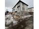 Modern two story building exterior with light colored siding and brick accents at 6643 W 52Nd Ave # C, Arvada, CO 80002