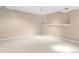 An unfurnished basement space with carpet flooring, painted walls, and simple decor at 9898 Tourmaline Ct, Parker, CO 80134