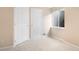 Bedroom with neutral carpeting, dual closets, and a window at 9898 Tourmaline Ct, Parker, CO 80134