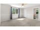 Spacious bedroom with large window and ensuite bathroom at 9898 Tourmaline Ct, Parker, CO 80134