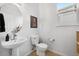 Modern bathroom with stylish sink, vanity, and lighting at 1761 S Buchanan Cir, Aurora, CO 80018