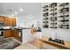 Modern kitchen with stainless steel appliances and open view to living space at 1761 S Buchanan Cir, Aurora, CO 80018