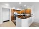 Modern kitchen with stainless steel appliances, a breakfast bar, and plenty of cabinet space at 1761 S Buchanan Cir, Aurora, CO 80018
