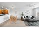 Open living space with dining area, comfortable seating and great natural light at 1761 S Buchanan Cir, Aurora, CO 80018