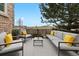 Relaxing outdoor patio space with cozy seating, perfect for enjoying the scenic views and sunshine at 1761 S Buchanan Cir, Aurora, CO 80018
