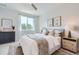Spacious bedroom with queen bed, neutral decor, and ample natural light at 388 E Orchard Rd, Centennial, CO 80121