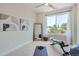 Spacious bedroom with large window and home gym setup at 388 E Orchard Rd, Centennial, CO 80121