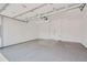 Clean and spacious garage with epoxy flooring and ample storage at 388 E Orchard Rd, Centennial, CO 80121
