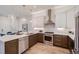 Modern kitchen with stainless steel appliances and a breakfast bar at 388 E Orchard Rd, Centennial, CO 80121