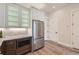 Modern kitchen with stainless steel appliances and white shaker cabinets at 388 E Orchard Rd, Centennial, CO 80121