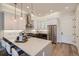 Modern kitchen with stainless steel appliances and white cabinets at 388 E Orchard Rd, Centennial, CO 80121