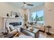 Spacious living room with large window and fireplace at 388 E Orchard Rd, Centennial, CO 80121
