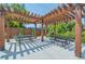 Relaxing community patio with pergola and picnic tables at 388 E Orchard Rd, Centennial, CO 80121