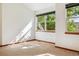 Bright bedroom with natural light, carpet flooring, and neutral walls provides a cozy space at 1024 Cottonwood Cir, Golden, CO 80401