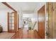 Bright foyer with gleaming hardwood floors and a staircase at 1024 Cottonwood Cir, Golden, CO 80401