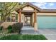 Charming home entrance featuring natural wood accents and a cozy, landscaped garden at 1024 Cottonwood Cir, Golden, CO 80401