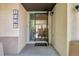Welcoming front porch view featuring a charming home doormat at 1024 Cottonwood Cir, Golden, CO 80401