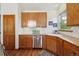 This kitchen boasts wood cabinets, stainless steel appliances and lots of counter space at 1024 Cottonwood Cir, Golden, CO 80401