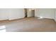 Spacious living room with neutral carpet and walls, offering a versatile space for relaxation and entertainment at 1024 Cottonwood Cir, Golden, CO 80401