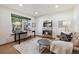 Well-lit home office with a modern desk and cozy seating area at 1024 Cottonwood Cir, Golden, CO 80401