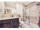 Modern bathroom featuring a sleek vanity, contemporary fixtures, and a glass-enclosed shower at 19 S 45Th Ave, Brighton, CO 80601