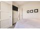 Bright bedroom featuring a TV, closet and neutral decor at 19 S 45Th Ave, Brighton, CO 80601