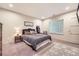 Cozy bedroom with a comfortable queen-sized bed, soft lighting, and a relaxing atmosphere at 19 S 45Th Ave, Brighton, CO 80601