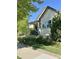 Inviting home featuring manicured front yard landscaping and a quaint covered front porch and stylish windows at 19 S 45Th Ave, Brighton, CO 80601