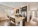 Modern kitchen with granite countertop, stainless steel appliances, and cozy breakfast bar at 19 S 45Th Ave, Brighton, CO 80601