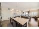 Bright kitchen with island featuring stone countertops and stainless steel appliances in open concept living space at 19 S 45Th Ave, Brighton, CO 80601