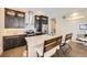 Contemporary kitchen with modern appliances, granite countertops and breakfast bar seating at 19 S 45Th Ave, Brighton, CO 80601