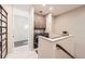 Convenient laundry area with modern washer and dryer, ample storage, and bright lighting at 19 S 45Th Ave, Brighton, CO 80601