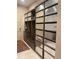 A mudroom features a custom built-in storage unit with drawers and metal-faced cabinets for stylish organization at 19 S 45Th Ave, Brighton, CO 80601