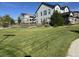 Large, well-maintained back yard with wooden fence and lush green lawn at 8739 Culebra St, Arvada, CO 80007