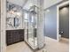 Luxurious bathroom with a walk-in shower, stylish vanity, and elegant finishes at 8739 Culebra St, Arvada, CO 80007