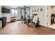 Home gym with professional grade equipment, rubber flooring, and natural light at 8739 Culebra St, Arvada, CO 80007