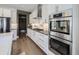 Well-equipped kitchen featuring stainless steel appliances, sleek cabinetry, and modern countertops at 8739 Culebra St, Arvada, CO 80007