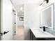 Stylish bathroom features a modern vanity with illuminated mirror and sleek black hardware at 655 Cree Cir, Boulder, CO 80303