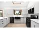 Modern kitchen with sleek cabinets, stainless steel appliances, and a window over the sink at 655 Cree Cir, Boulder, CO 80303